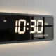 A digital wall clock displaying the current time in Los Angeles, California.